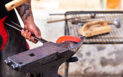 Blacksmith working on the anvil